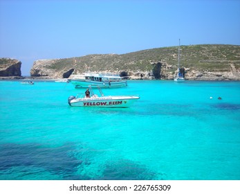 COMINO, MALTA - MAY 30, 2008: Transparent, Cyan Waters Of The Blue Lagoon On The Island Of Comino, Which Is A Popular Location For Filmmakers. It Appears In The Movie Troy And Other Hollywood Movies.