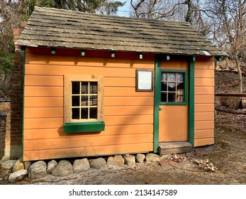 Commack, NY, USA, 3.5.22 - A Historical Playhouse Called The Hoyt Family Playhouse. This Play Area Has A Real Fireplace Built In And Is Made Of Wood.