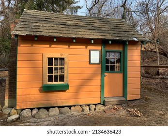 Commack, NY, USA, 3.5.22 - A Historical Playhouse Called The Hoyt Family Playhouse. This Play Area Has A Real Fireplace Built In And Is Made Of Wood.