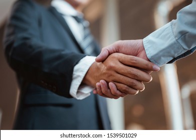 Commander handshaking new employee congratulating with starting a new job. Teamwork collaboration concept for business partners, Meetings and greetings concepts.