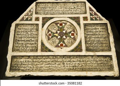 Commemoration Stone In Four Languages Commemorating The Death Of The Mother Of Priest Grisanto In 1148.  Stone Mirrors Period Of Multiple Cultures Co-existing Within Norman Kingdom Of Sicily.