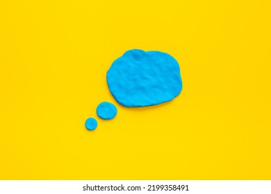 Commenication and messengers concept with text speech bubbles made of plasticine.
