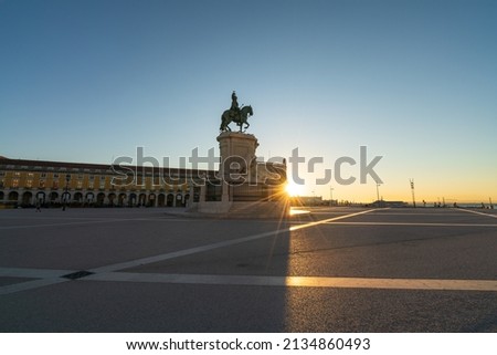 Commerce Square (Praca do Comercio) at sunrise with statue of of King Jose I in Lisbon. Portugal