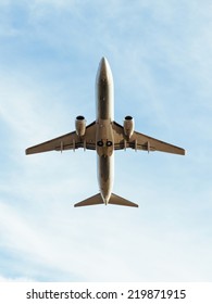 A Commercial Air Plane Take Off, Seen From Below.