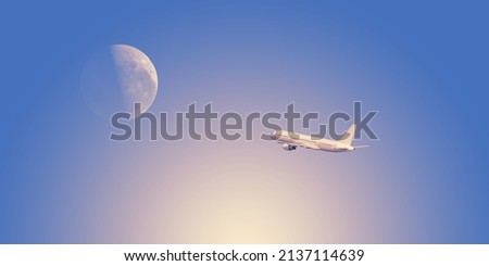 commercial airplane flying towards full moon in beautiful sky, travel concept. dramatic sky background