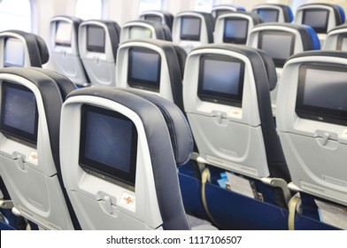 Commercial airplane seats viewed from the rear