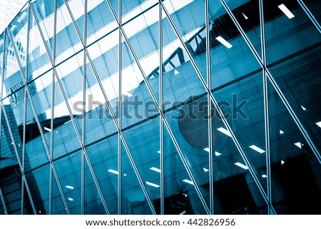 Similar – mirrored facade of an office building