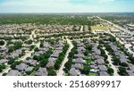 Commercial buildings and residential houses along Keller Parkway, Farm to Market Road 1709 near downtown Keller, Texas, fast-growing mixed-use development area suburbs Dallas Fort Worth, aerial. USA