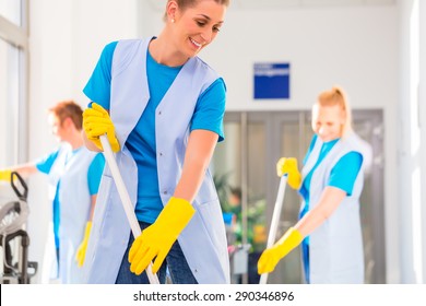 Commercial Cleaning Brigade Working Mopping The Floor