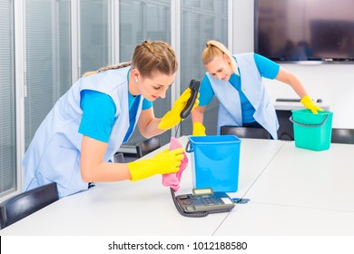 Commercial Cleaning Crew Ladies Working As Team In Office