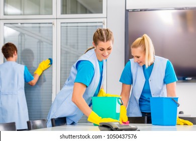 Commercial Cleaning Crew Ladies Working As Team In Office