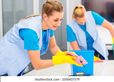 Commercial Cleaning Crew Ladies Working As Team In Office