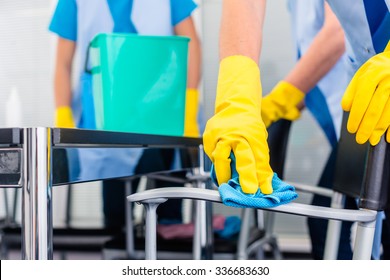 Commercial Cleaning Crew Ladies Working As Team In Office