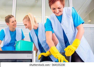 Commercial Cleaning Crew Ladies Working As Team In Office