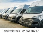 Commercial delivery vans parking in a row, transporting and shipping service company