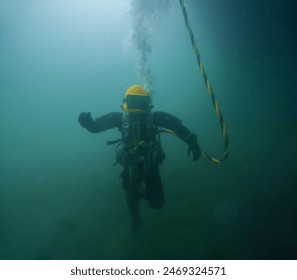 Commercial diver with vintage diving helmet closeup - Powered by Shutterstock