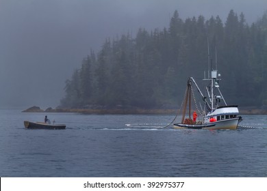 A Commercial Fishing Boat Seines For Salmon In Prince William Sound Near Valdez, Alaska