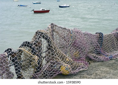 Commercial Fishing Nets And Boats In The Oyster Capital Of France.