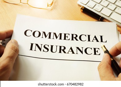 Commercial Insurance Form On A Table.