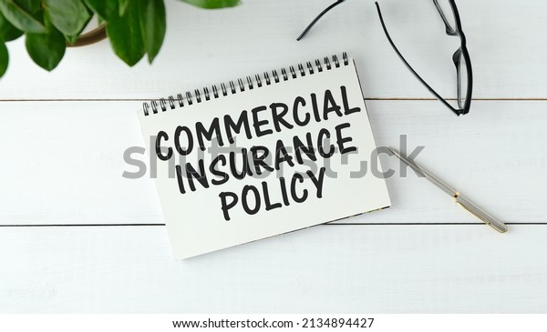 Commercial
insurance policy- text label in the contract document on the
planning folder. Transfer of risk in business by purchasing an
insurance policy from an insurance
company.