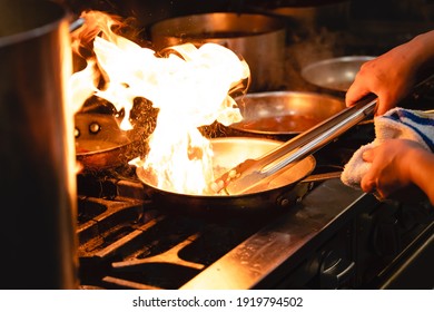 Commercial Kitchen Cooking With Fire