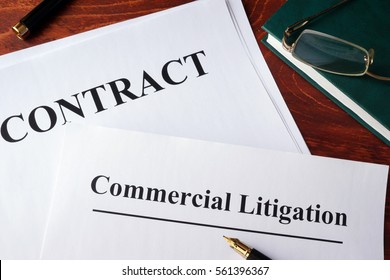 Commercial Litigation Form And Contract On A Table.