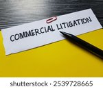 Commercial litigation writting on table background.