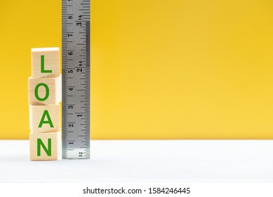 Commercial Loan Sizing And Measurement Concept : Word Loan Measured By A Ruler, Depicts Loan To Value Ratio Where The Size Is How Much Loan The Lender Able To Give Borrower Or Client Related To Value