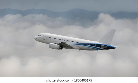 Commercial passenger aircraft, Commercial airliners are flying with the power of a jet engine in the sky above white clouds and mountain peaks.