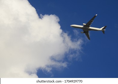 commercial plane flying in sky
