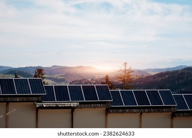 Commercial shops with solar panels on the roof. Nature-produced energy. Sun-produced energy. Photovoltaic systems on the barn house in the countryside. The concept of renewable energy