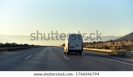 commercial van is delivering cargo to countryside