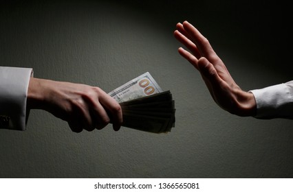 Committing A Crime. Closeup Image Of Businessman Taking Stack Of Money As Bribe. Executive Taking Money, Bribery And Illegal Business Among Senior Officials. Corrupt Practices. Corruption. Bribe.