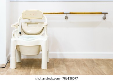 Commode Chairs And Portable Toilets For Elderly, Side View With Copy Space And Text.