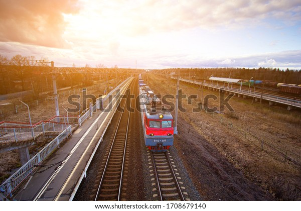 Commodity cars on the railway. Cargo transportation.\
Panorama of wagons awaiting loading. Russian railway. Russia,\
Tosno, April 20, 2020