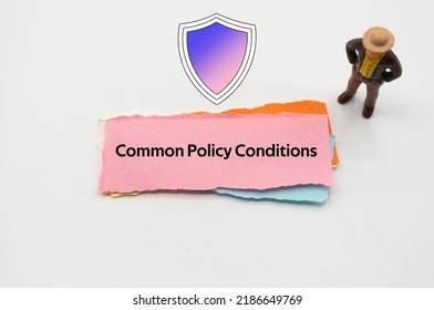 Common Policy Conditions.The word is written on a slip of colored paper. Insurance terms, health care words, Life insurance terminology. business Buzzwords. - Shutterstock ID 2186649769