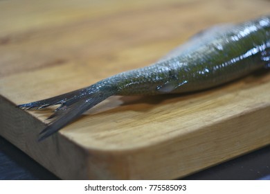 Common Whitefish On A Wooden Chop Board.