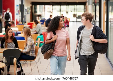 Communal Area Of Busy College Campus With Students