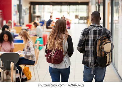 Communal Area Of Busy College Campus With Students