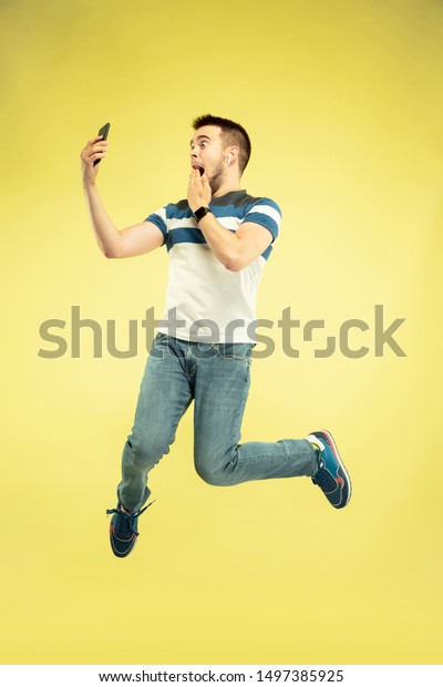 Communication Full Length Portrait Happy Jumping Stock Photo 1497385925 ...