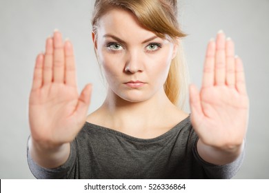 Communication Psychology Negative Defensive Concept. Assertive Woman Making Stop Gesture. Strong Blonde Lady Showing Hold Sign.