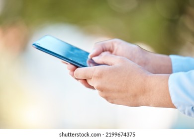 Communication, Social Media And A Man Typing On A Phone In A Park With Bokeh. Contact, Email And Technology To Talk To Friends And Family From Any Location With Fast Wifi Or 5g Internet Connection