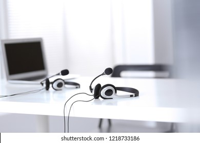 Communication support, call center and customer service help desk at empty office with no operators - Shutterstock ID 1218733186