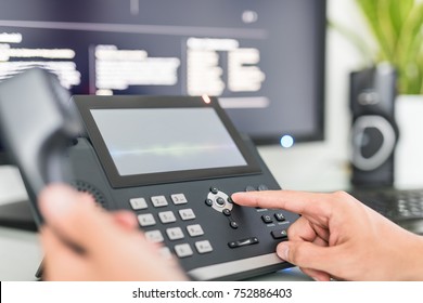 Communication support, call center and customer service help desk. Using a telephone keypad. 