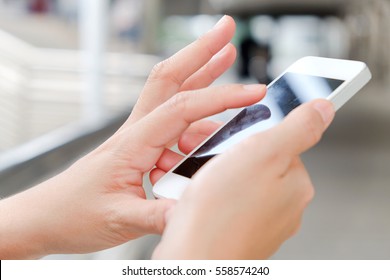 communication technology concept, close up image of people using smart phone