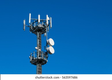 Communication Tower Against Crystal Clear Blue Sky Background