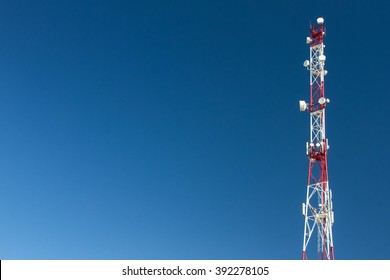 communication tower,cell tower,against blue sky

