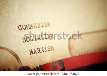 Communism Socialism Marxism text written with a typewriter.