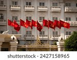 Communist flags in front of a government building