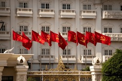Communist Flags In Front Of A Government Building